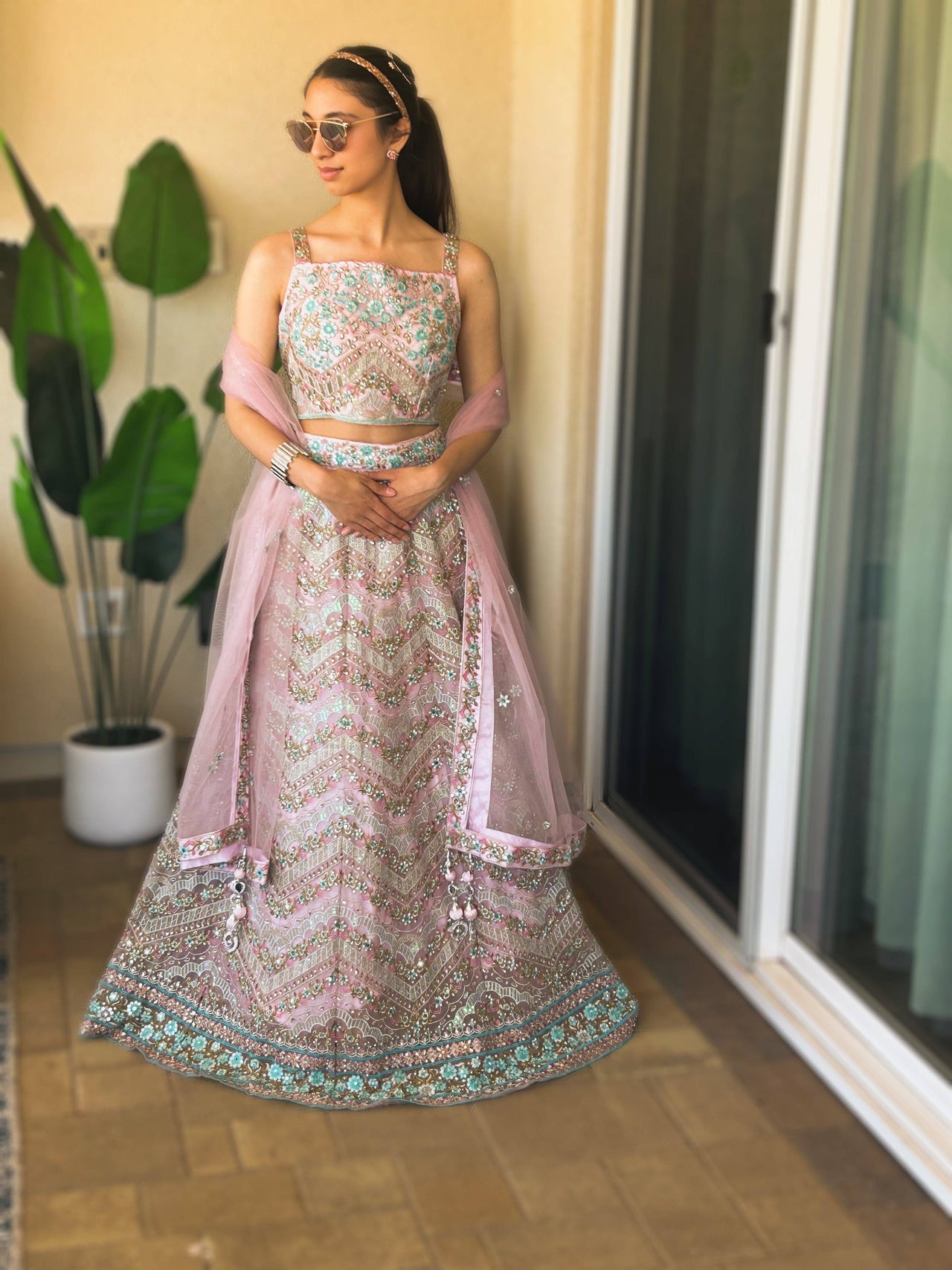 exclusive stone work pastel pink designer lehnga